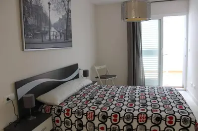 Cama o camas de una habitación en Bonito apartamento en primera línea de campo de golf y vistas al mar