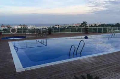 Piscina en o cerca de Bonito apartamento en primera línea de campo de golf y vistas al mar