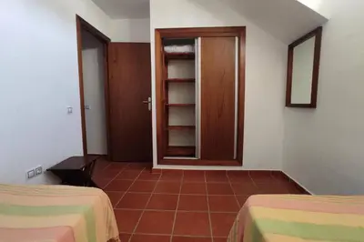Cama o camas de una habitación en Casa Kenya: Dúplex con azotea y magníficas vistas.