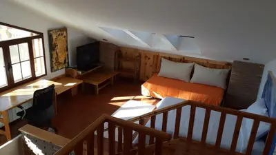 Una televisión o centro de entretenimiento en Villa Family Kids 