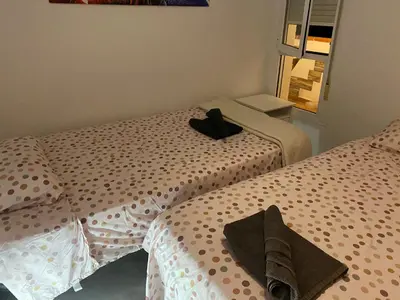 Cama o camas de una habitación en Encantador ático con chimenea y piscina en Almería