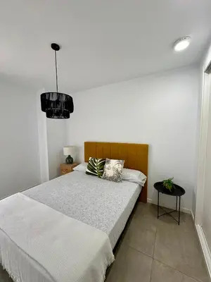 Cama o camas de una habitación en OCEAN APARTAMENT !! 1ª Línea del Mar, piscina, parking, wifi