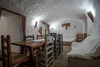Cama o camas de una habitación en Alojamiento Cuevas Victoria