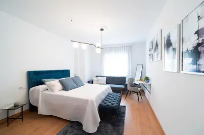 Cama o camas de una habitación en Expoholidays - General Tamayo PARKING gratis
