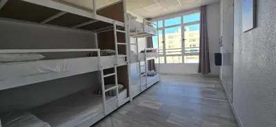 Cama o camas de una habitación en Albergue Club Náutico de Águilas