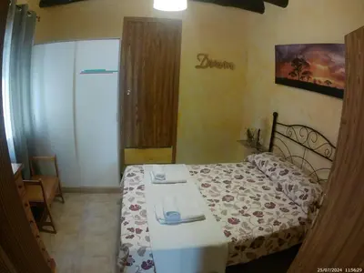 Cama o camas de una habitación en Miguel y Rosa