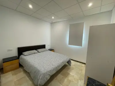 Cama o camas de una habitación en Apartamento en Olula del Río
