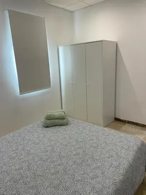 Cama o camas de una habitación en Apartamento en Olula del Río