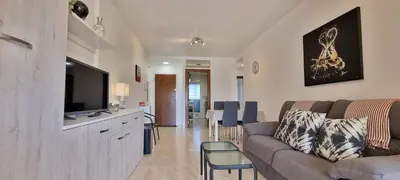 Una televisión o centro de entretenimiento en Homes of Spain, Salinas de Vera, Apartmento 2 dormitorios, 2 baños, vistas piscina, WIFI