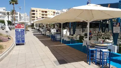Un restaurante o sitio para comer en Homes of Spain, Salinas de Vera, Apartmento 2 dormitorios, 2 baños, vistas piscina, WIFI