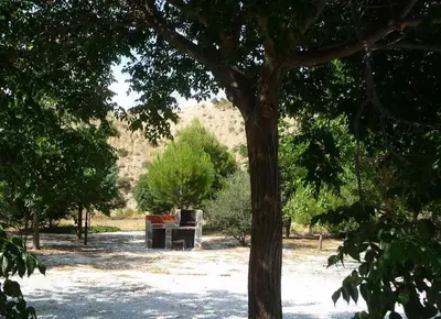 Jardín al aire libre en Cabañas Negratín