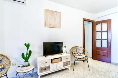 Una televisión o centro de entretenimiento en TrendyHomes El Puerto de Almería, próximo Playa y Centro,3 HAB, Espacioso, Familias, Wifi