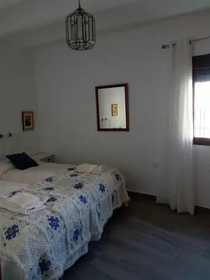 Cama o camas de una habitación en Casa cueva rural Vico, ideal grandes grupos