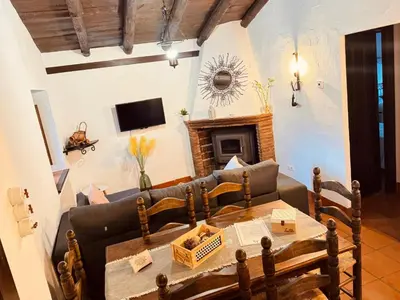 Una televisión o centro de entretenimiento en Molino de Santa Águeda