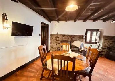 Una televisión o centro de entretenimiento en Molino de Santa Águeda