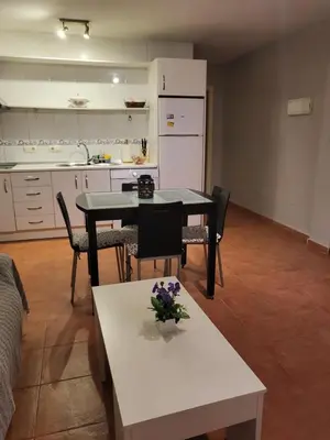 Una cocina o zona de cocina en Casa baja preciosa con jardín privado en primera línea naturista!