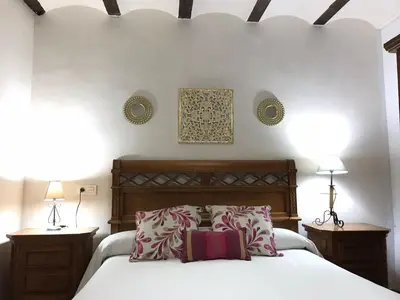 Cama o camas de una habitación en Casa Teatro RAÍCES