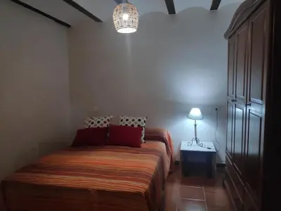 Cama o camas de una habitación en Casa Teatro RAÍCES