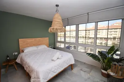 Cama o camas de una habitación en Expoholidays - Apartamentos Puerto Almerimar