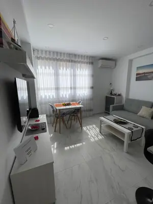 Una televisión o centro de entretenimiento en Apartamento Costa de Almería a 50m Playa San Miguel