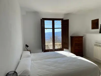 Cama o camas de una habitación en Apartamentos El Cabo