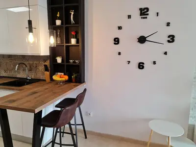 Una cocina o zona de cocina en Sybarix Apartment: Precioso apartamento con vistas al golf y el mar