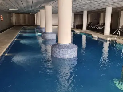 Piscina en o cerca de Sybarix Apartment: Precioso apartamento con vistas al golf y el mar