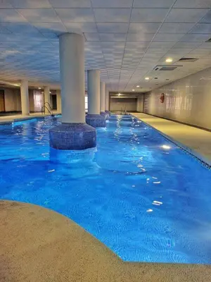 Piscina en o cerca de Sybarix Apartment: Precioso apartamento con vistas al golf y el mar