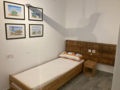 Cama o camas de una habitación en Alojamiento rural Los Pérez Lucainena de las Torres