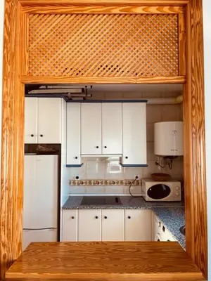 Una cocina o zona de cocina en Oasis La Isleta