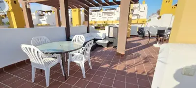 Un balcón o terraza de Homes of Spain, Atico Lomas del Mar V con vistas al mar y solárium grande, WIFI