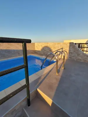 Piscina en o cerca de Ático dúplex en primera línea con piscina privada!