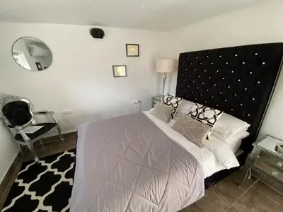 Cama o camas de una habitación en Casa Dolly Boutique B&B