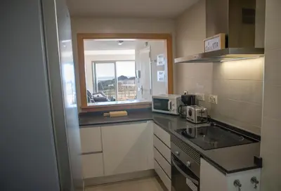 Una cocina o zona de cocina en Mundo de sol golf et plage
