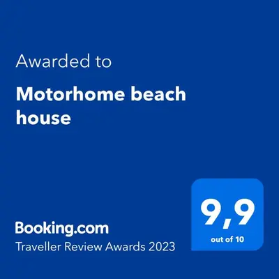 Certificado, premio, señal o documento que está expuesto en Motorhome beach house