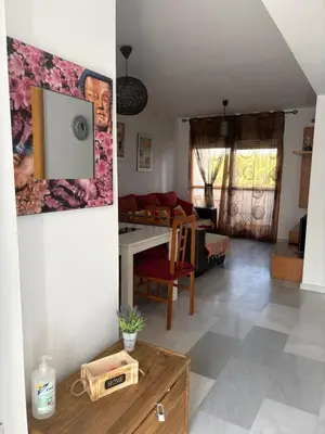 Una televisión o centro de entretenimiento en Apartamento El Toyo