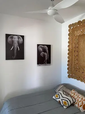 Cama o camas de una habitación en Vivienda de uso turístico Los Escullos Acantilado