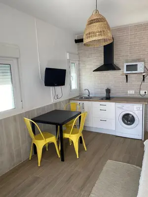 Una cocina o zona de cocina en Vivienda de uso turístico Los Escullos Acantilado