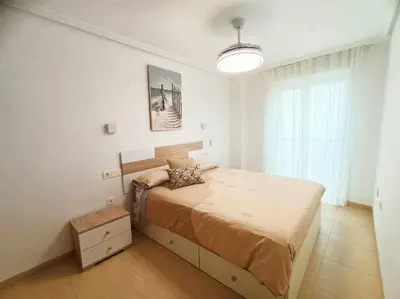 Cama o camas de una habitación en La Glorieta-Apartamento céntrico con vista al mar