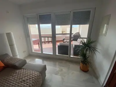 Zona de estar de Apartamento Familiar Torre del Rayo