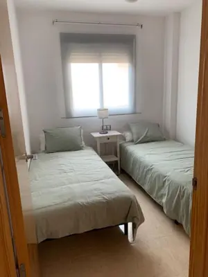 Cama o camas de una habitación en Apartamento Sierra y Mar