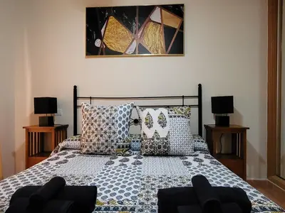 Cama o camas de una habitación en ¡Bajo precioso con salida directa a la piscina comunitaria en Paraíso de Vera!