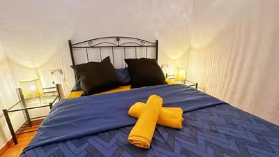 Cama o camas de una habitación en Troglorent - Maison Troglodyte