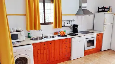 Una cocina o zona de cocina en Troglorent - Maison Troglodyte