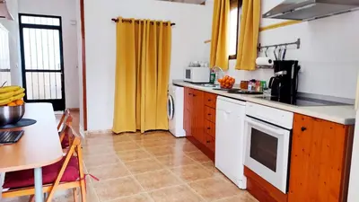 Una cocina o zona de cocina en Troglorent - Maison Troglodyte