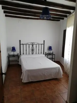 Cama o camas de una habitación en Apartamentos Rurales Lanteira