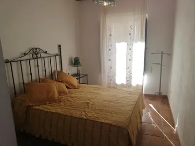 Cama o camas de una habitación en Apartamentos Rurales Lanteira