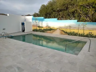 Piscina en o cerca de Precioso loft con piscina comunitaria