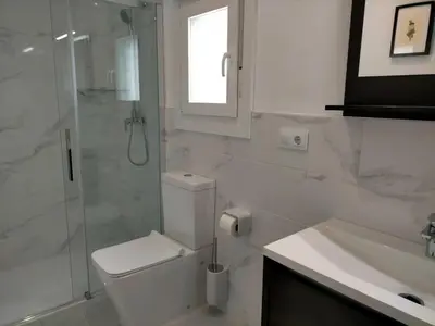 Un baño de Precioso loft con piscina comunitaria