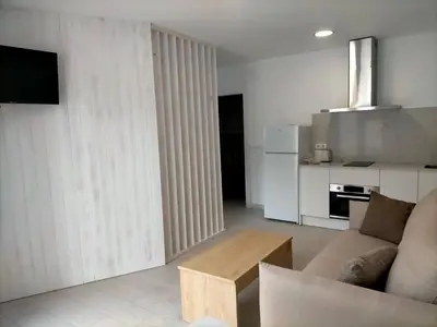Una cocina o zona de cocina en Precioso loft con piscina comunitaria
